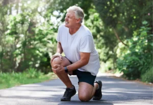patient on a hike with patellar dislocation in their kneecap.